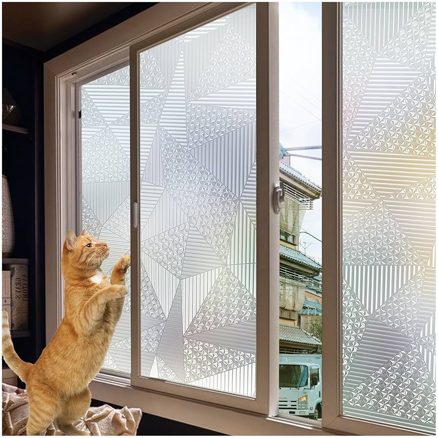 リビングドアにセリアの窓目隠しシートhappy day