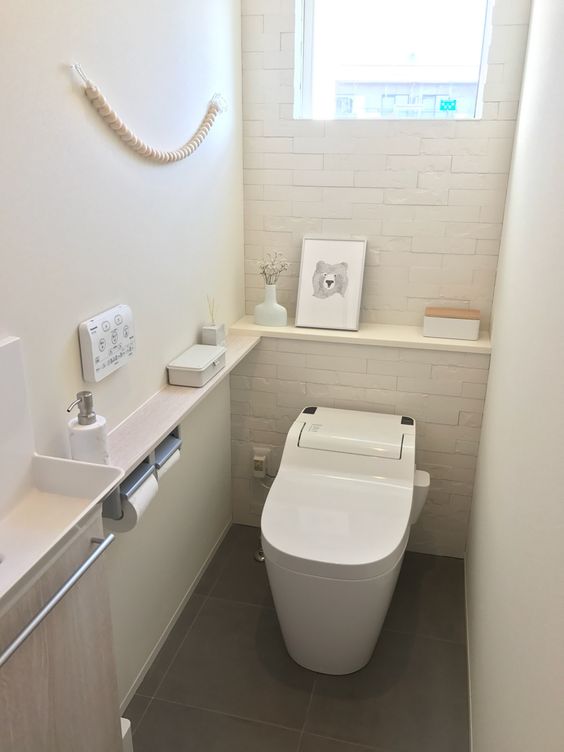 ウィリアムモリスのクロスとエコカラットをあしらったエレガントなトイレ